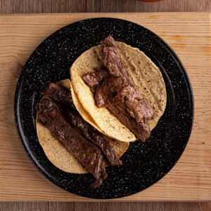 Tacos de bistec de sirloin (orden de 3 tacos).